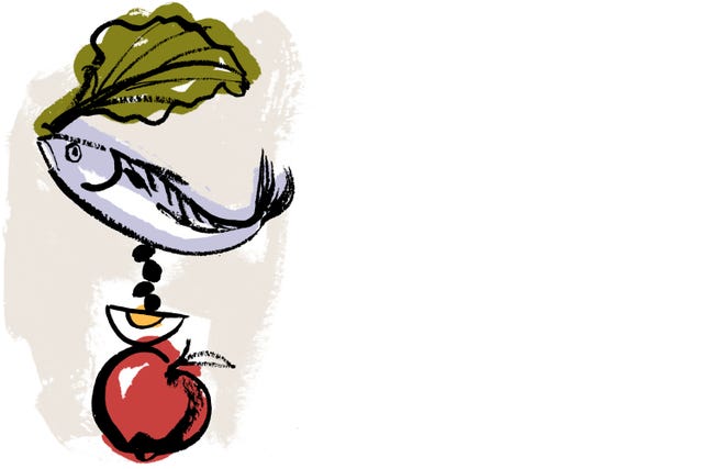 apple, egg, fish, and lettuce stacked up