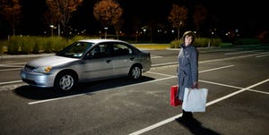 Woman alone in car park