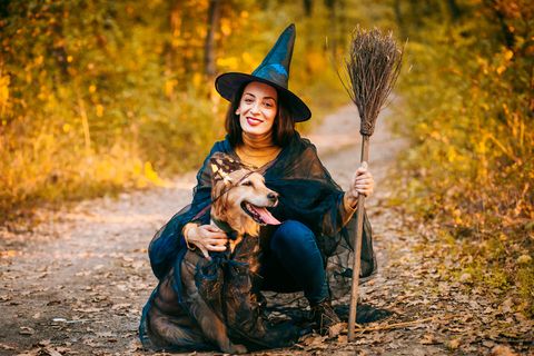 woman and dog costumed for halloween