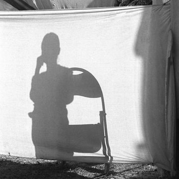 woman and shadow vautha fair, gujarat, india, asia, 1983
