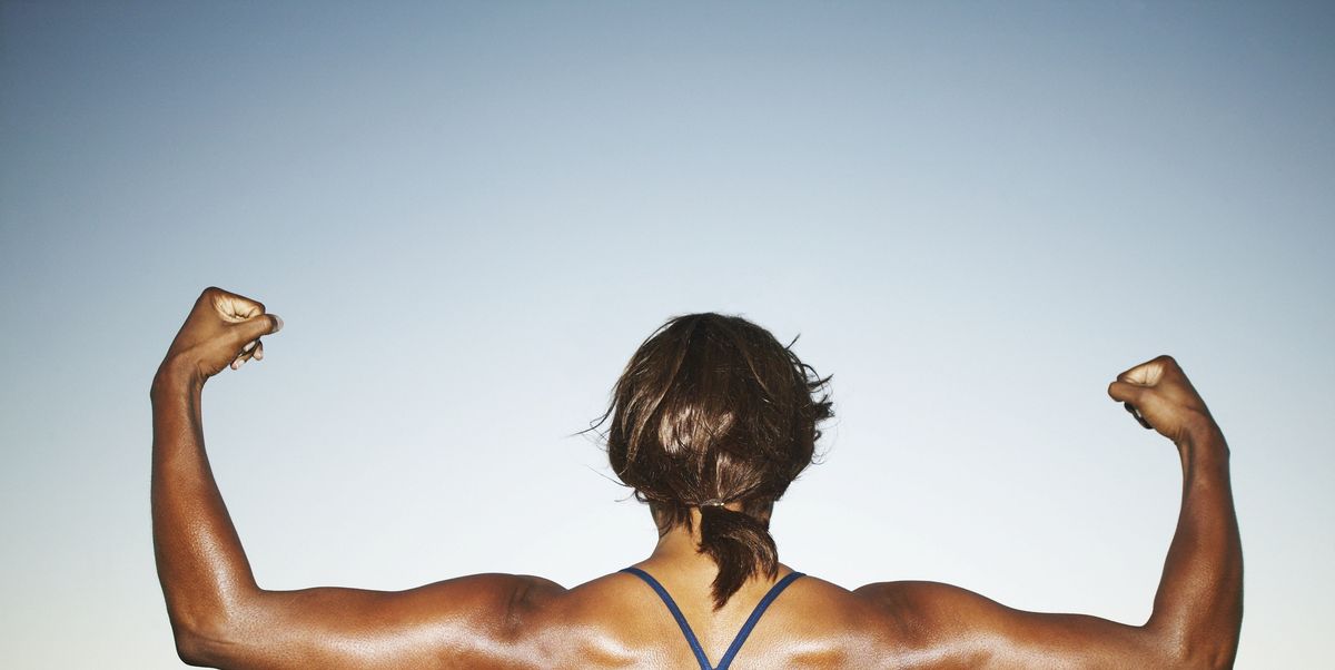 https://hips.hearstapps.com/hmg-prod/images/woman-bodybuilder-flexing-arms-top-section-rear-royalty-free-image-1755285327.pjpeg?crop=1.00xw:0.754xh;0,0.246xh&resize=1200:*