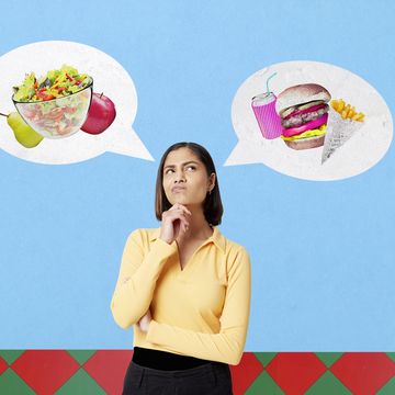 woman choosing between healthy food and junk food