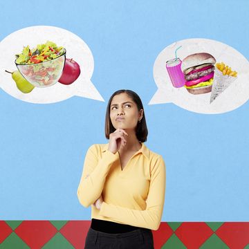 woman choosing between healthy food and junk food