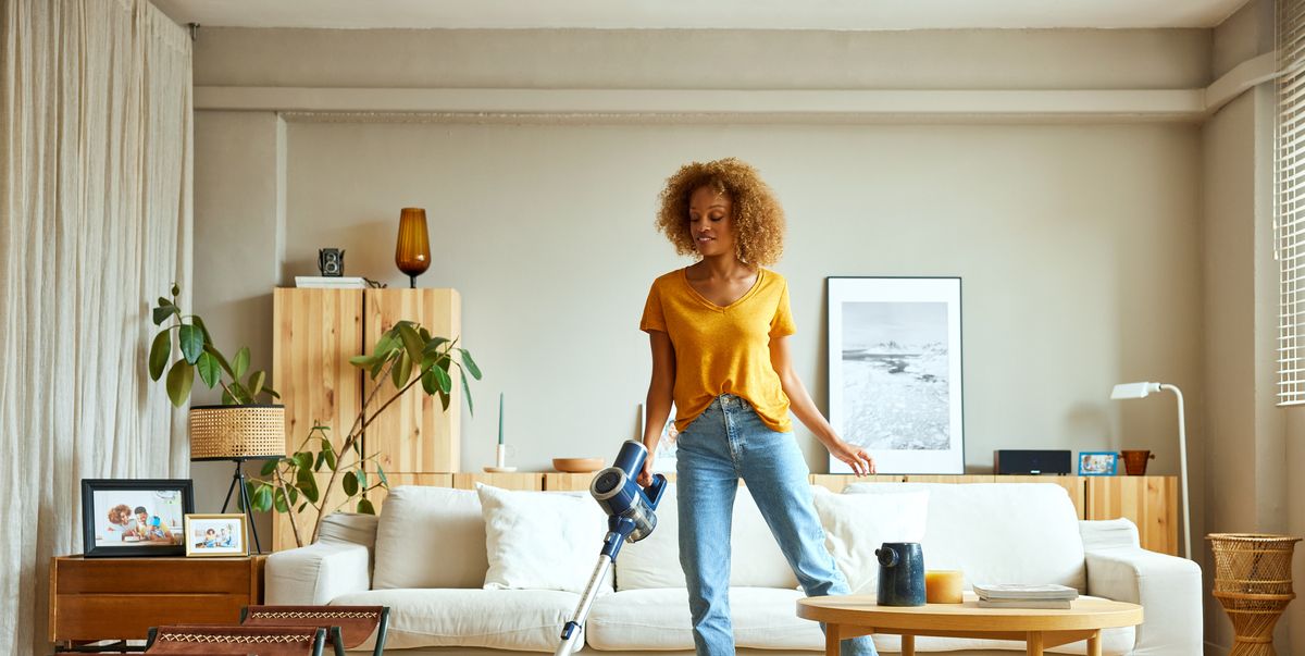 https://hips.hearstapps.com/hmg-prod/images/woman-cleaning-carpet-with-vacuum-cleaner-at-home-royalty-free-image-1679413415.jpg?crop=1.00xw:0.753xh;0,0.180xh&resize=1200:*