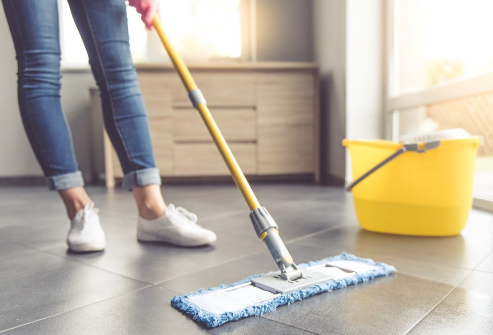 Woman cleaning her house