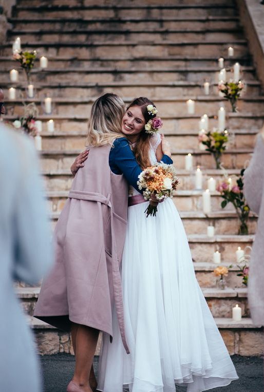 https://hips.hearstapps.com/hmg-prod/images/woman-congratulating-bride-at-rustic-cottage-royalty-free-image-926598134-1559709748.jpg?crop=0.669xw:1.00xh;0.129xw,0&resize=980:*