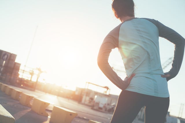 woman doing side stretch exercise