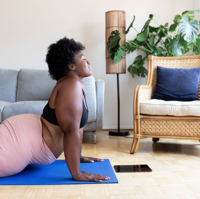 woman doing yoga exercise at home