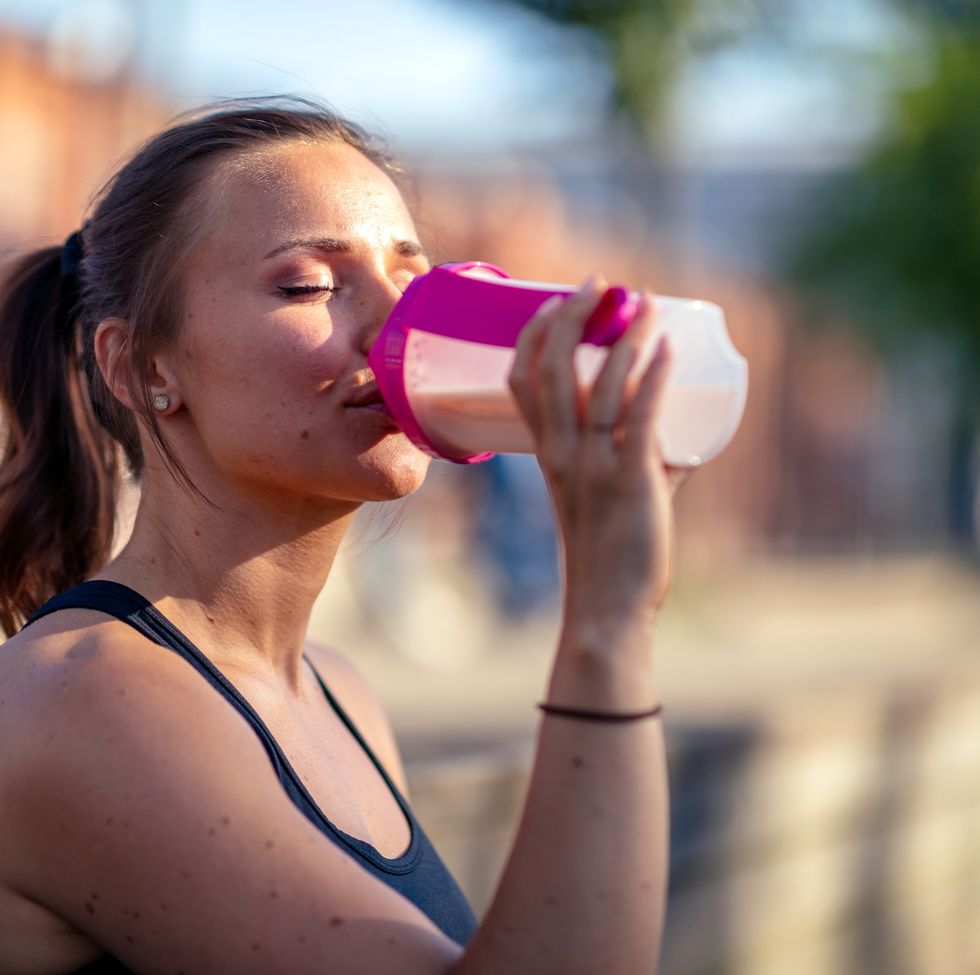 woman drinking protein shake