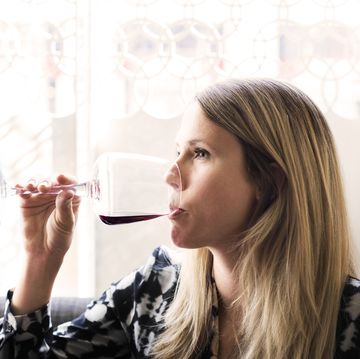 woman drinking red wine at lebanese restaurant