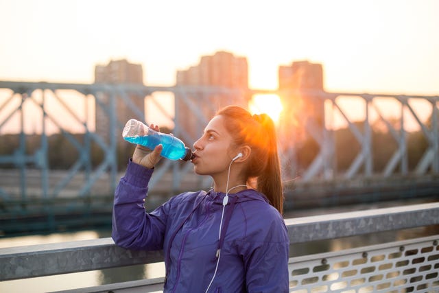 Woman drinking vitamin water