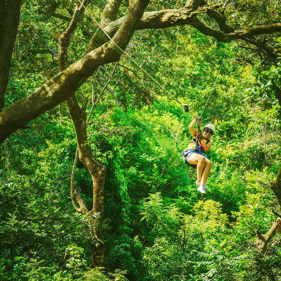 woman during a canopy tour costa rica