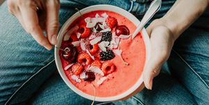 Woman Eating Healthy Smoothie Bowl