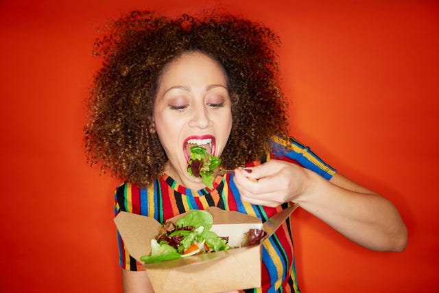 woman eating salad