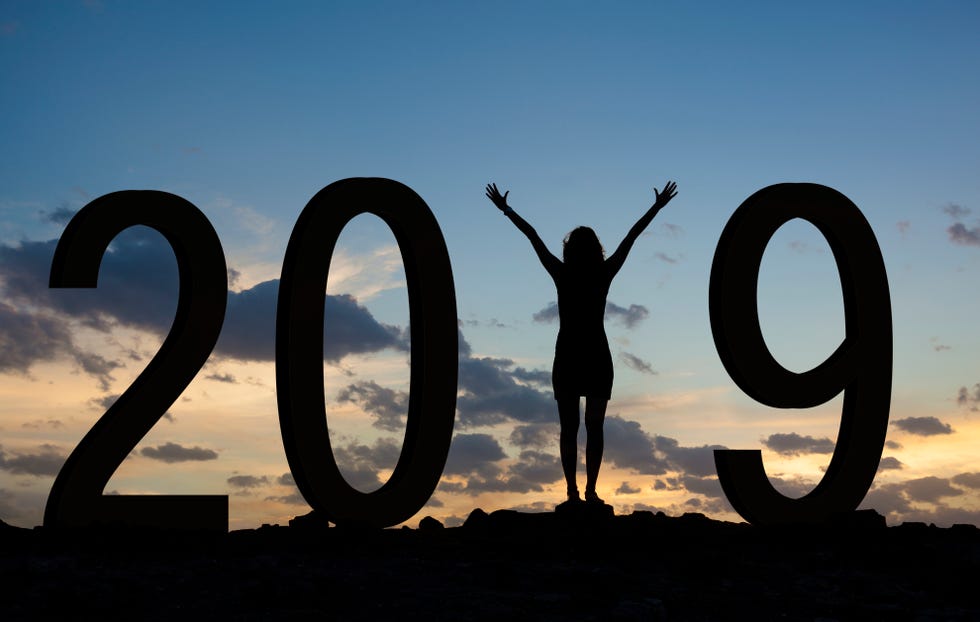 Woman enjoying on the hill while celebrating the new year