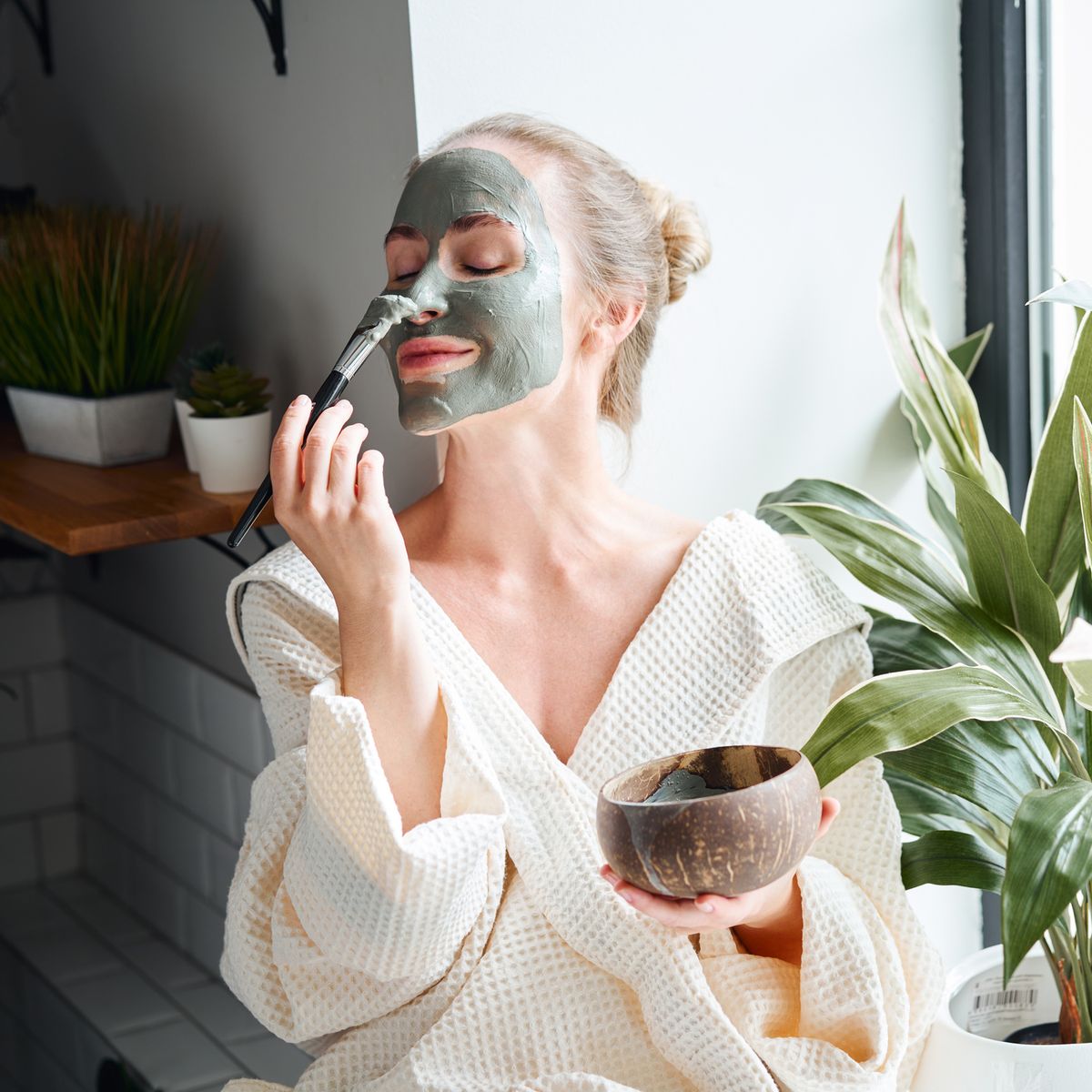 https://hips.hearstapps.com/hmg-prod/images/woman-enjoying-skin-care-treatment-at-home-royalty-free-image-1671634815.jpg?crop=0.667xw:1.00xh;0.138xw,0&resize=1200:*