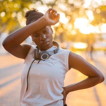 young woman exhausted exercising outside young woman exhausted exercising outside