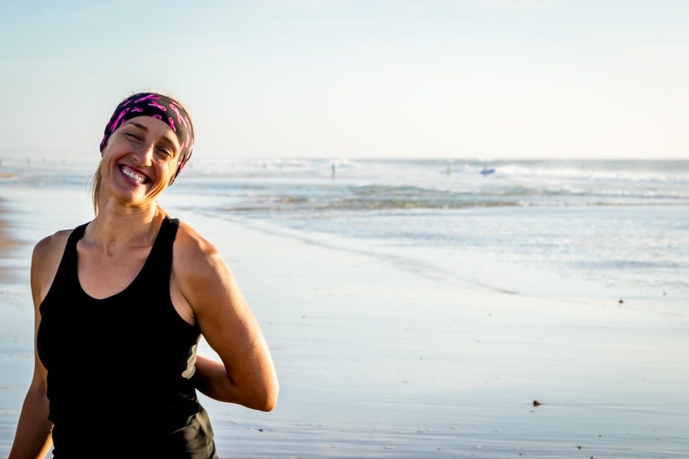 mujer cancer playa