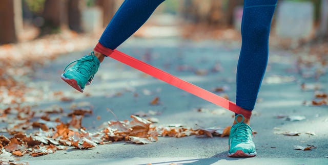 Woman Exercising with Resistance Band