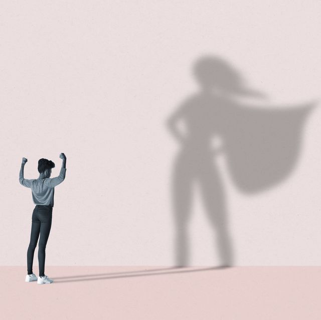 understanding autism spectrum disorder in women woman flexing muscles in front of superhero shadow