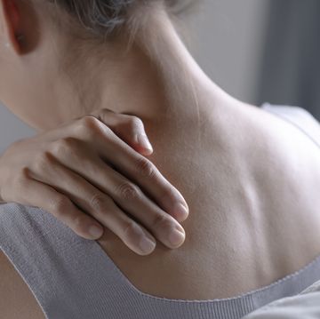 woman has shoulder pain
