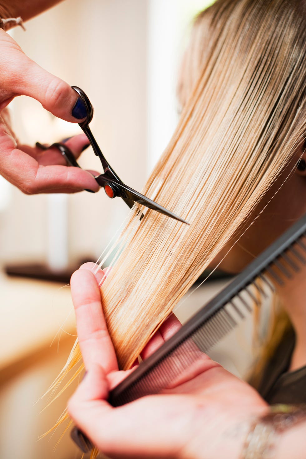 woman having haircut