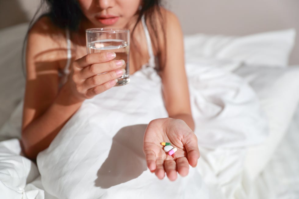 woman drinking water before bed