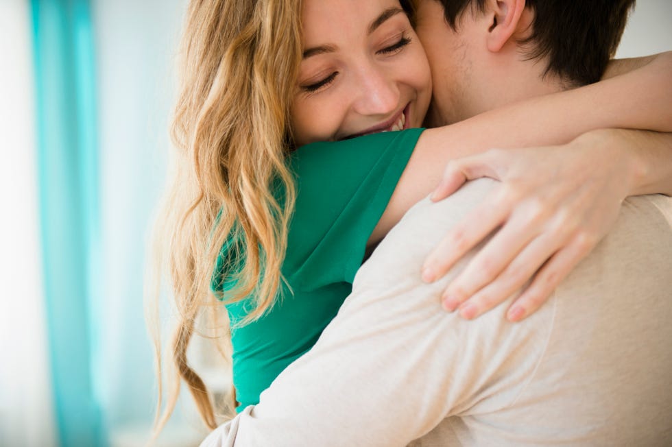 woman hugging boyfriend