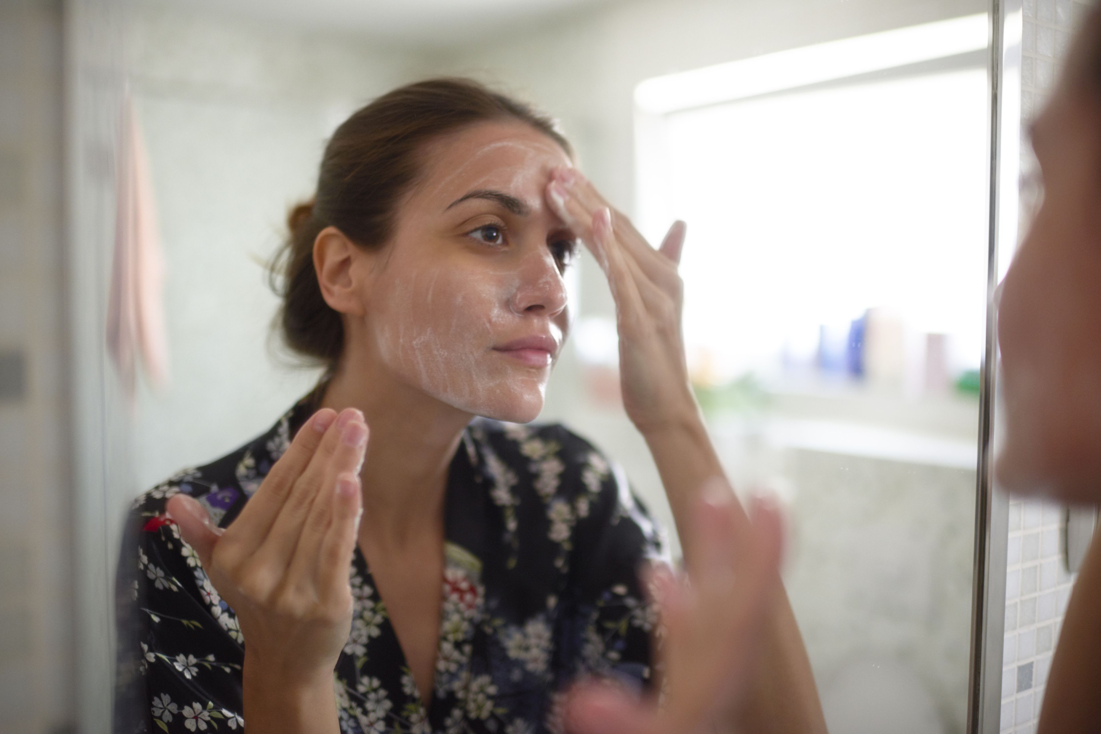 woman acne face wash