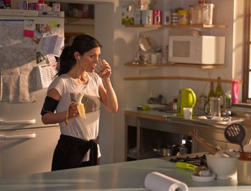 woman in the kitchen preparing for run