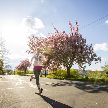 woman jogging in park, portland, oregon, usa