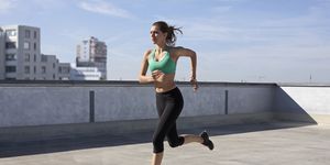 woman jogging on rooftop