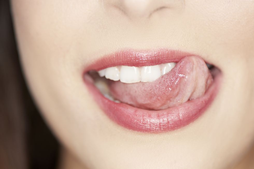 woman licking lips