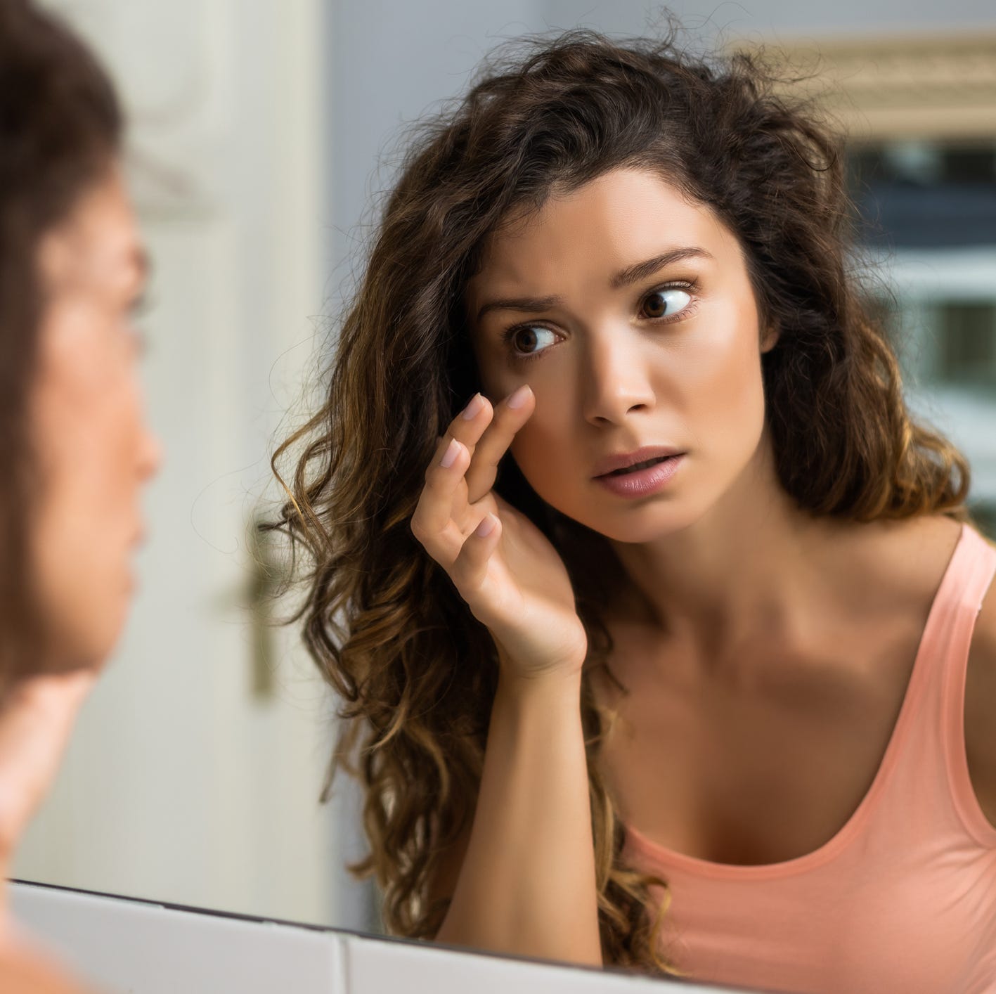 Why Is My Face Swollen? 12 Underlying Causes, According to Doctors