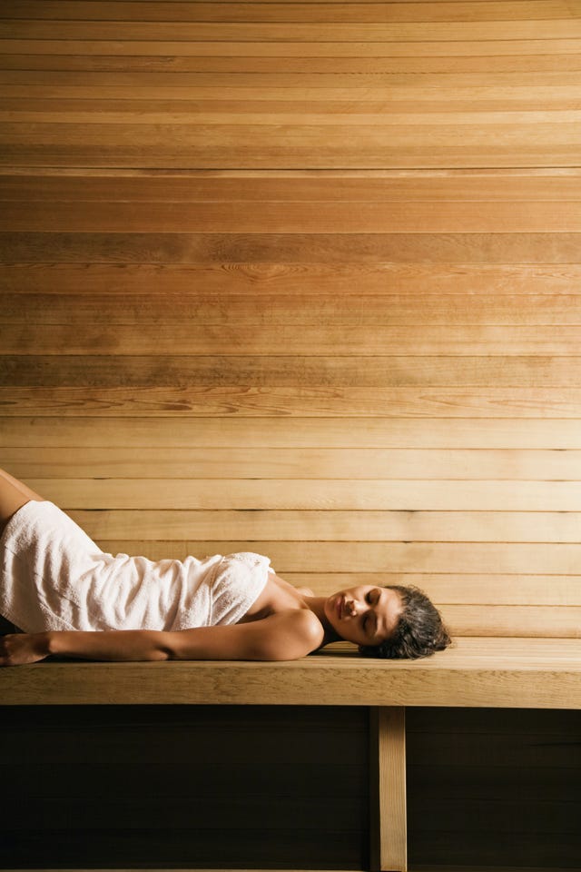 woman lying in sauna