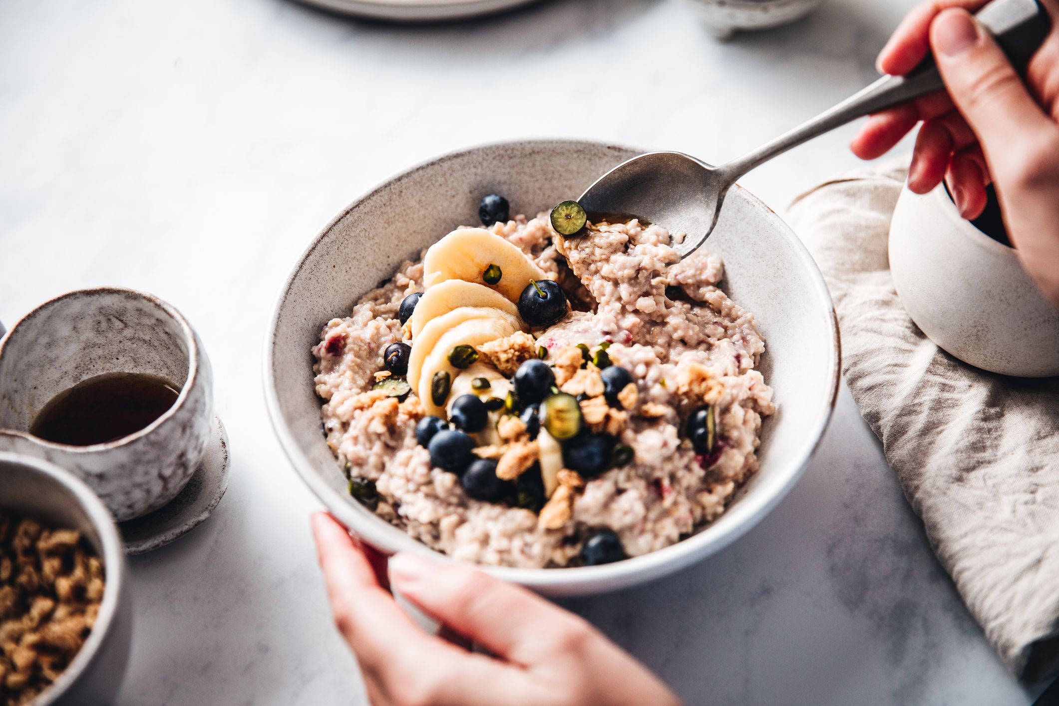 Free Photo  Elevated view of healthy breakfast with electronic