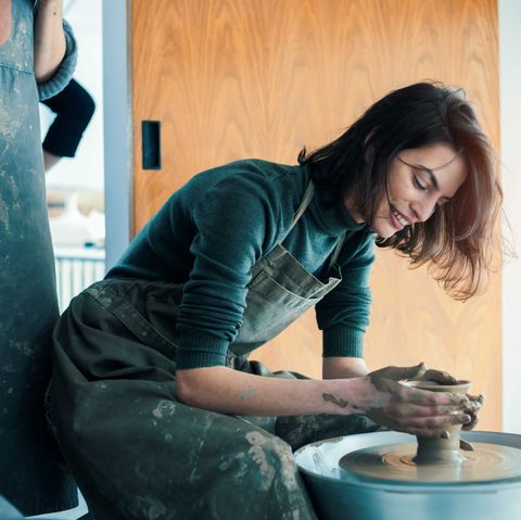 woman making pottery