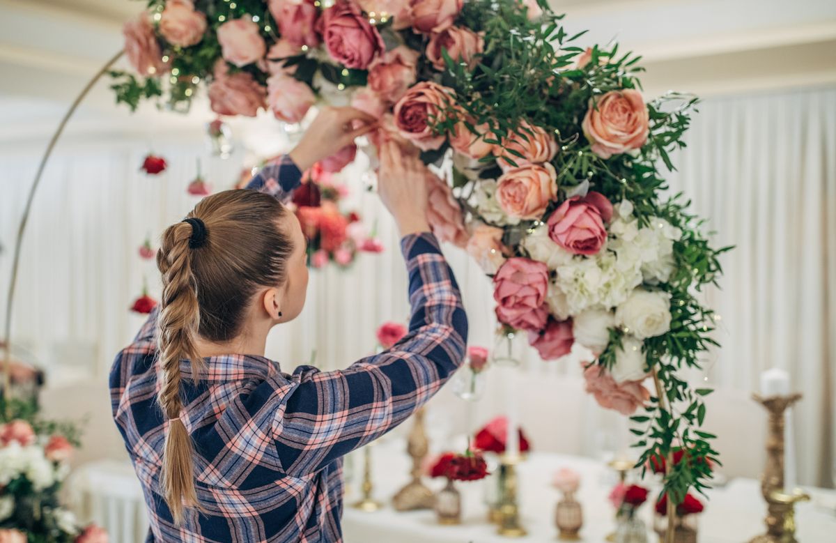 wedding florist making decorations