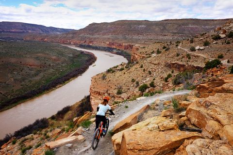 Woman mountain biking in Fruita Colorado