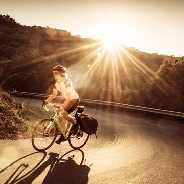 woman on solo bicycle road trip