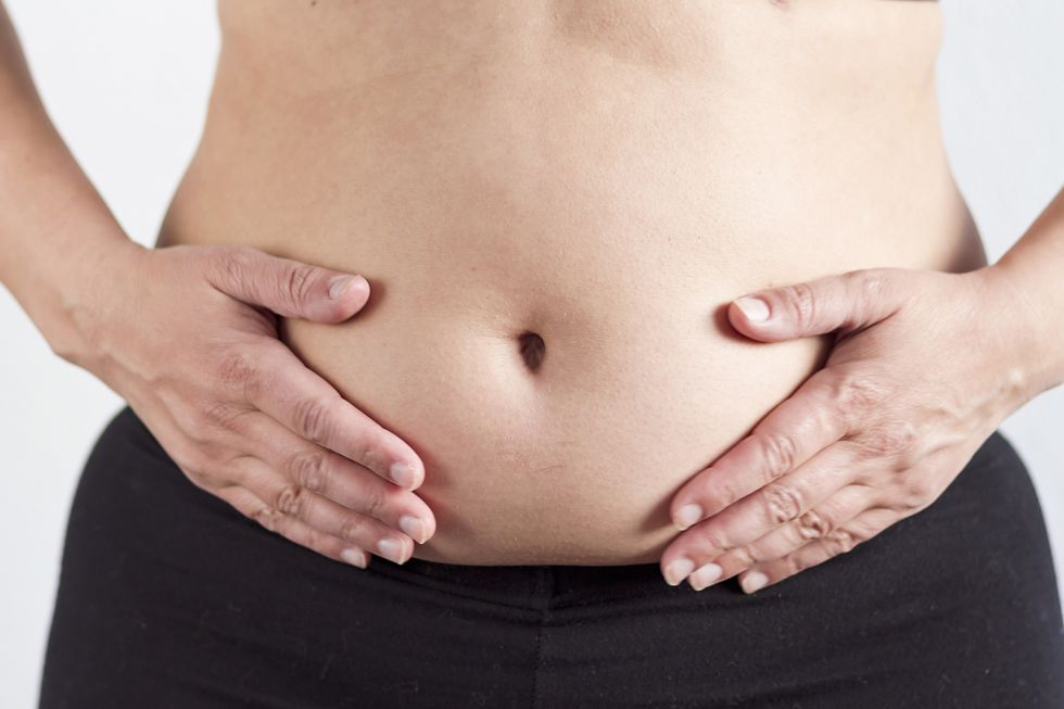 woman overweight belly
