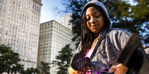 Woman packing after working out in the city