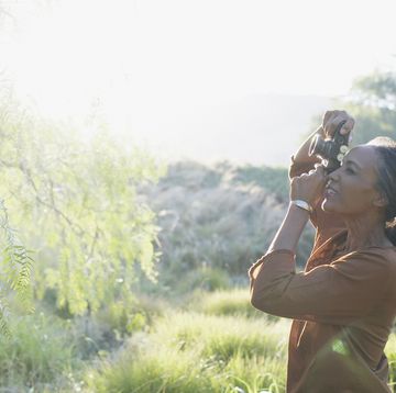 woman photographing nature