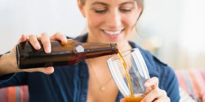 woman pouring beer