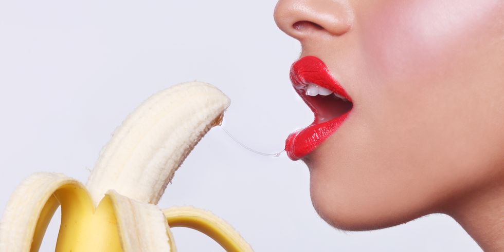 Woman Preparing to Eat a Banana