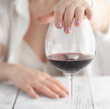 woman refused a glass of wine