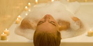 woman relaxing peacefully in a spa resort