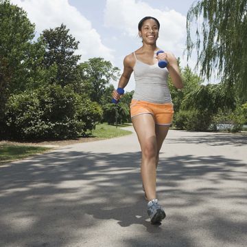 woman running in street