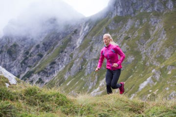 woman running on mountain