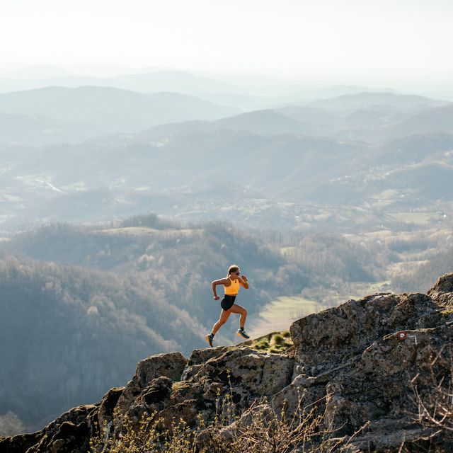 woman running on mountain